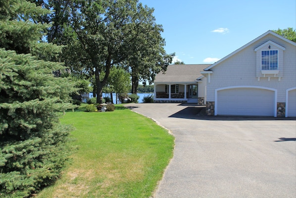 Enjoy views from the front porch and lots of room in driveway for vehicles.