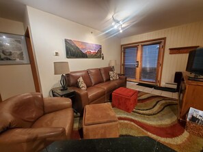 Living room has French doors that go out to a walk-way - 5 steps to garage!
