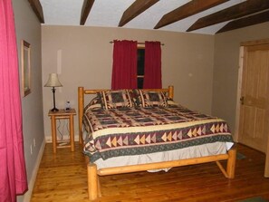 Upstairs Master Bedroom w/ King Bed and Master Bathroom; Walk-in Closet & TV.