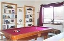 One loft area is a billiard room.