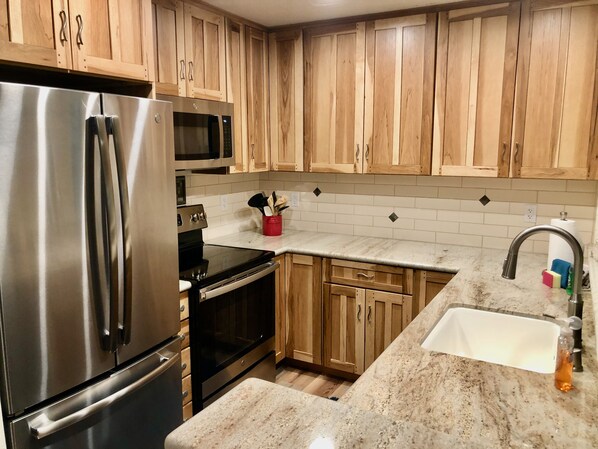 Upgraded Kitchen with granite counters
