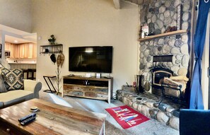 Living area featuring a 65" HD SmartTV
