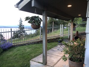 Your front porch offers a lovely view of the Salish Sea and mountains.