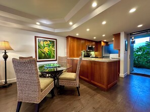 Indoor dining area towards kitchen