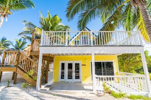 Front of the Cottage by the Sea.  Multiple terraces.  