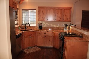 Granite Kitchen with Lots of Gadgets

