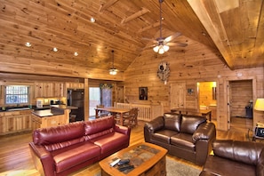 Another Photo Of The Open Living Area With A View Of The Deck And Kitchen.