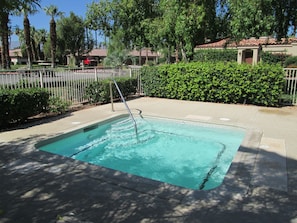 Fabulous hot tub next to the pool & a perfect place to relax!