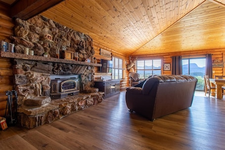 Cozy up by the fire place in our spacious living room.