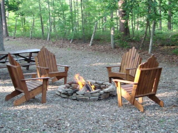 Fire Pit with String Lights, 4 Adirondack Chairs and Picnic Table