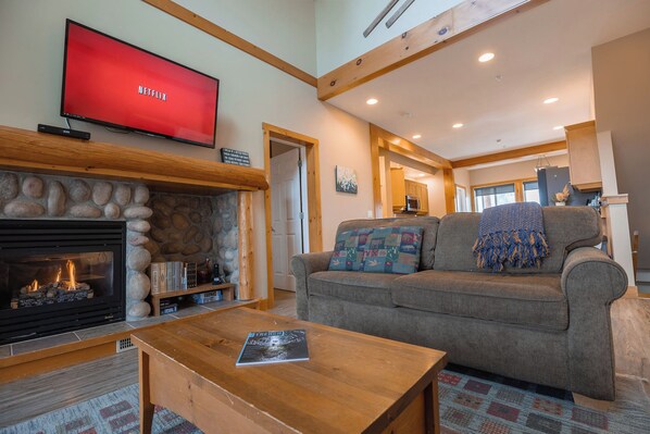 Living room with 49" Smart TV and Shaw cable. 