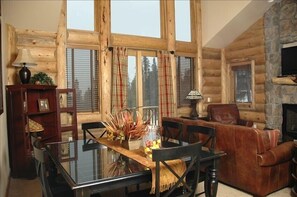 Dining with French Doors Balcony and Mountain Views