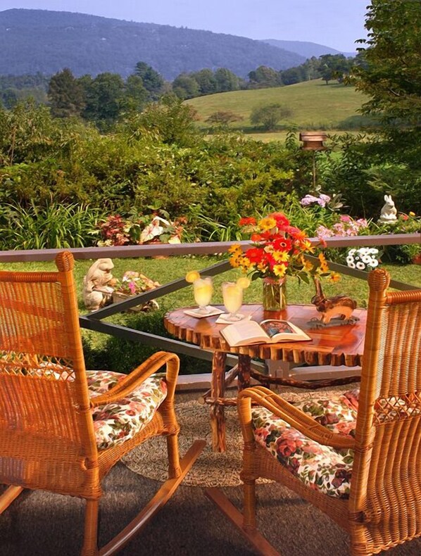 Relax, enjoy the view from this  newly. 
screened-in, comfy rocking chair porch!