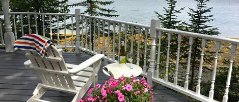 Deck overlooking bay. Great spot to read and sip wine.