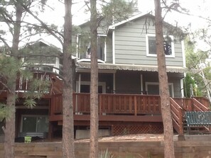 Upper and lower decks from backyard
