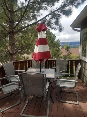 upper deck with gorgeous views and patio seating