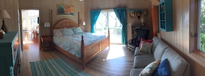 The master bedroom with a beautiful king bed