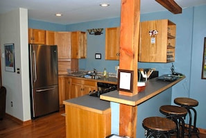 Full kitchen. All dishes, large and small appliances, and paper goods provided.