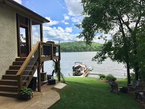 Screened porch, fire pit and hammock lake side.  