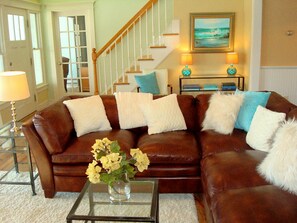 Comfy, cozy family room. Leather sectional.