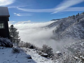 Above the clouds on an early winter morning