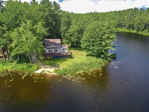 Aerial view of house and water way