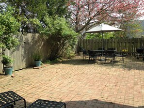 Back Patio with Grills and outside shower