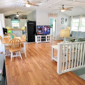 Main Level Living and dining area... looking into kitchen and 1 of the bedrooms