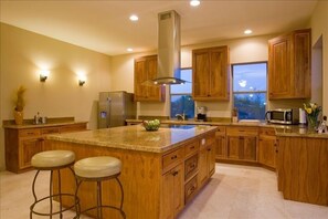 Gourmet Kitchen with Stainless Appliances and Granite Counters
