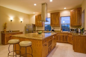 Gourmet Kitchen with Stainless Appliances and Granite Counters