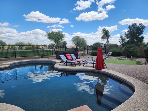 Backyard with pool and spa.  The golf course is directly behind the fence.