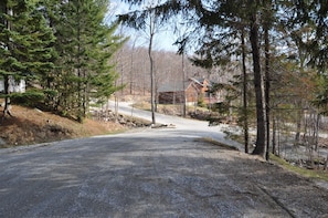 view of trail from the street in front of condo