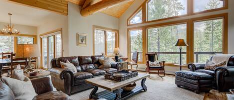 upstairs living area and dining room.  Lone Peak framed in window