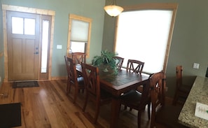Dining room with extended table (leaf removed in picture.)