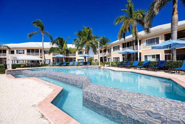 Kaibo Phase 2 Infinity Pool on white sandy beach overlooking the Caribbean Sea