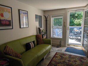 The living area opens onto the rear deck on Race St. This is the guest entrance.