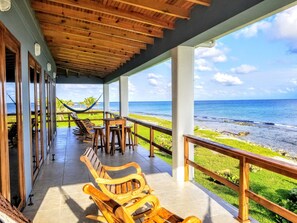 Beautifully handcrafted rocking chairs to relax and listen to the ocean waves.