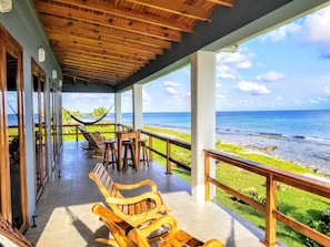 Beautifully handcrafted rocking chairs to relax and listen to the ocean waves.