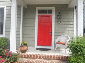 The red door welcomes you!