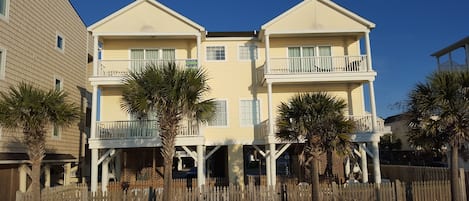 View from the beach to your townhome. LowTide is the one on the left