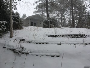 The house from the road in the winter.