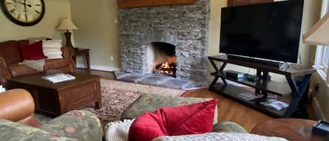 Spacious living room with lots of light.