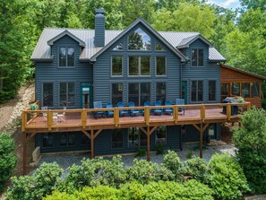 Lake facing view of the house with large grilling deck