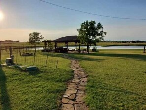 Pavilion area with grill and picnic tables