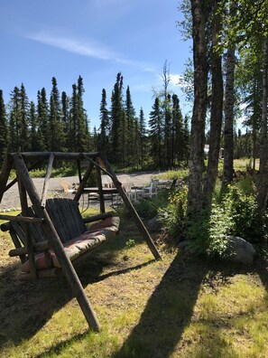 Swing and fire pit area