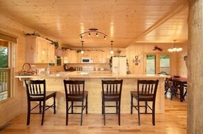 Fully equipped kitchen and breakfast bar