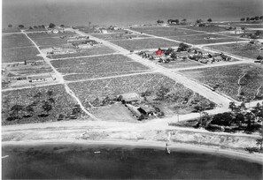 1930's photo of East Pensacola Heights. Red Star Identifies this cottage.