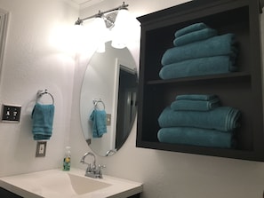 Newly renovated bathroom with plush 100% cotton towels