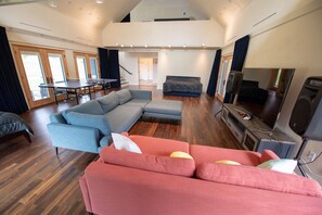 First fl living area w/TV, game console, ping pong, two beds for extra sleeping