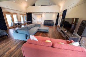 First fl living area w/TV, game console, ping pong, two beds for extra sleeping